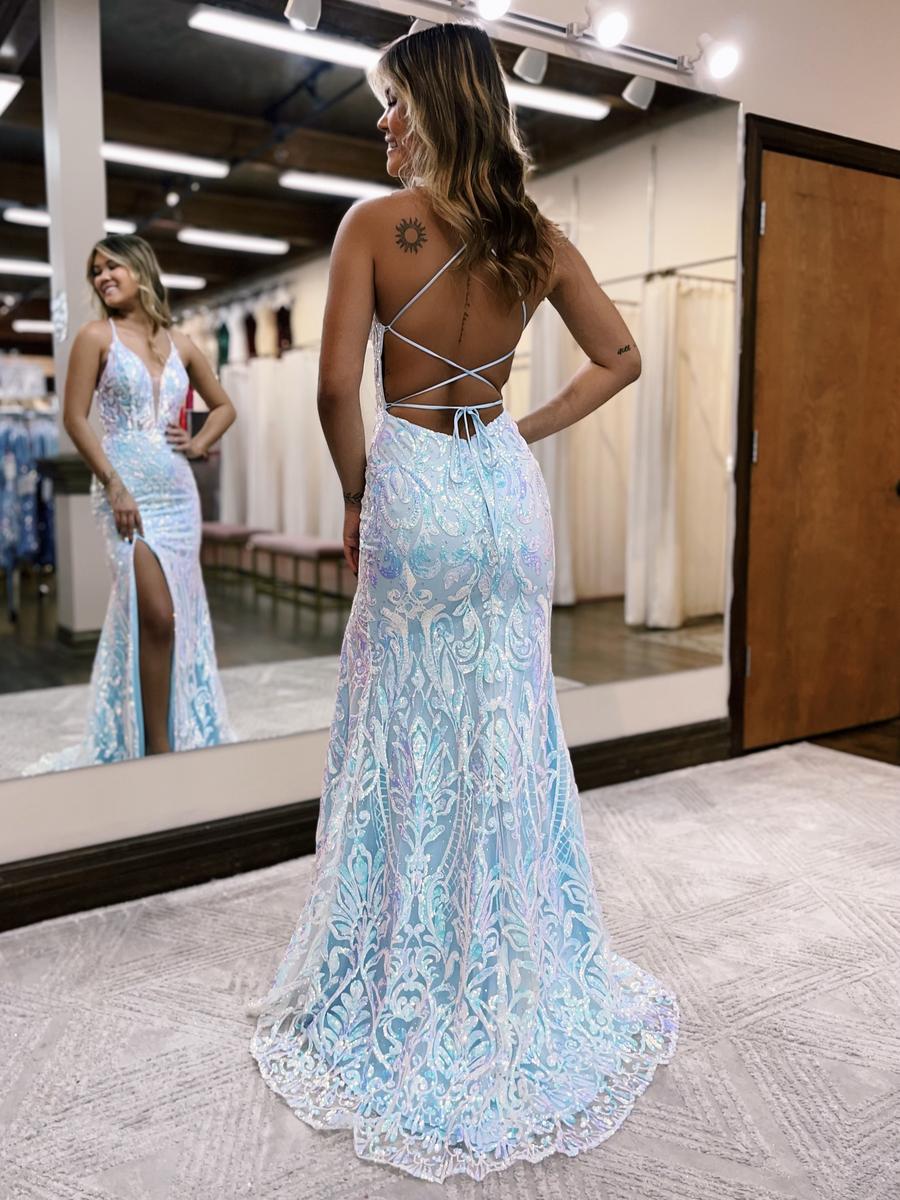 Prom dress features iridescent sequins in a beautiful pattern throughout the gown