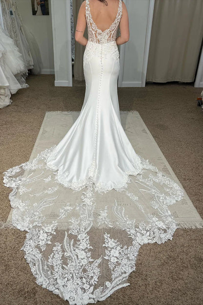 Elegant White Deep V-Neck Mermaid Wedding Dress With Lace Accents Sleeveless